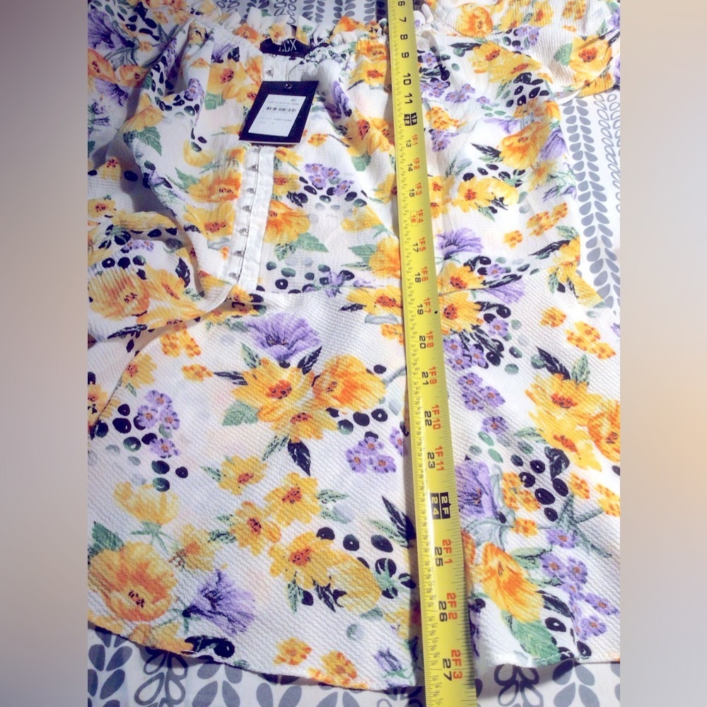 NEWT CITY CHIC PEPLUM FLORAL TOP. - Picture 4 of 11